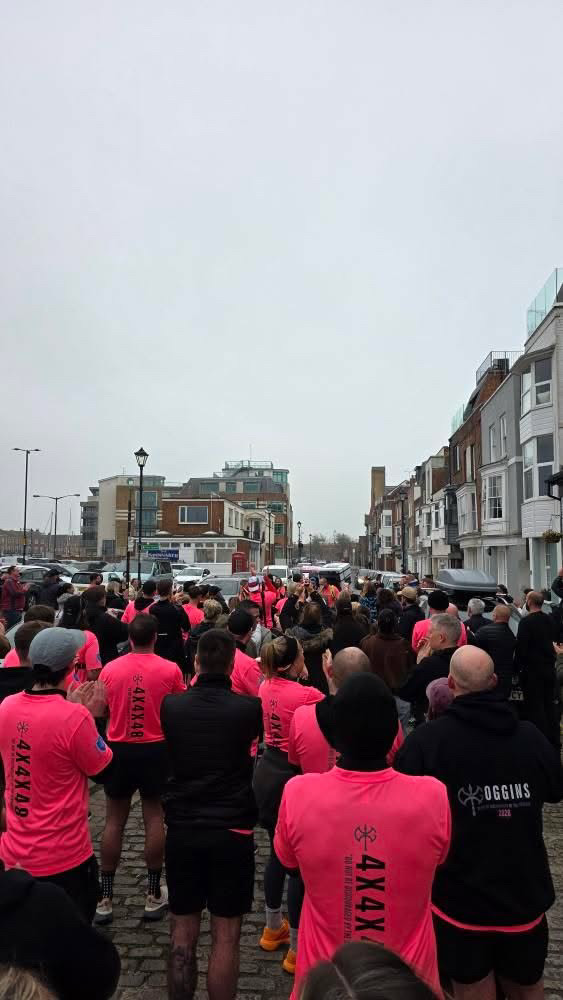 Sidekick community gathered in pink challenge kit at a 4x4x48 event in Old Portsmouth.